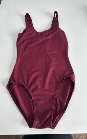 Burgundy woman’s leotard. Built in shelf bra. Size XS thumbnail 1