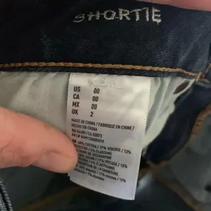 American Eagle dark wash distressed 00 shortie jeans shorts thumbnail 2