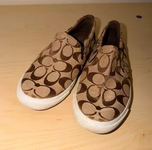 Coach Allegra Signature C Slip-On Sneakers thumbnail 1