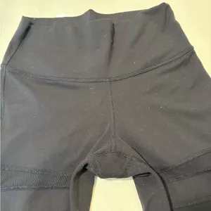 Lululemon black mesh leggings (flawed) size 4. thumbnail 6