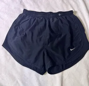 Nike Women's Black Athletic Running Shorts with White Swoosh thumbnail 1
