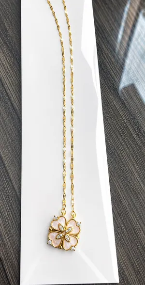 Gold necklace with 4 heart thumbnail 1