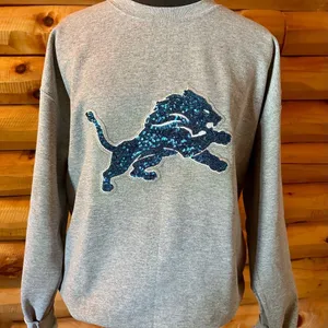 Detroit lions sweater! NFL Gray Sweatshirt with Blue Glitter Logo! Size large thumbnail 1