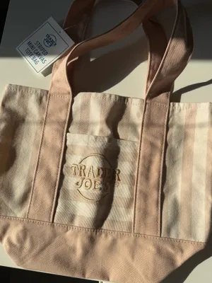 Trader Joe’s exclusive tan teal spring 2026 tote bag thumbnail 1