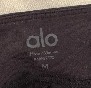 Alo Black Flared Yoga Pants With Slits thumbnail 3