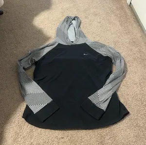 Nike Black and White Striped Dri-FIT Hoodie thumbnail 1
