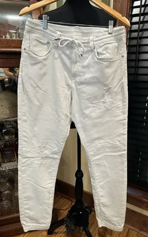EUC H&M white distressed waist string skinny jeans thumbnail 1