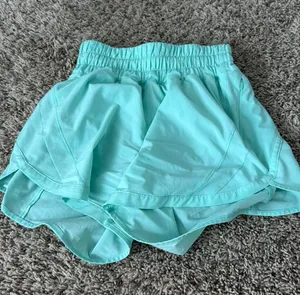 Teal Lululemon Shorts Speed Up 4" thumbnail 1