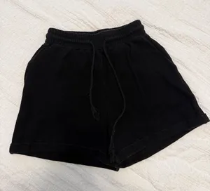 HALARA Women's high waisted Black Athletic Lounge Shorts thumbnail 1