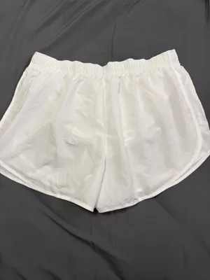 Nike Women’s White Athletic Running Shorts with Reflective Swoosh thumbnail 2