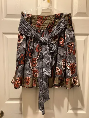 Anthropologie Mixed-Print Tiered Mini Skirt in Rust, Olive, Navy, Cream thumbnail 1
