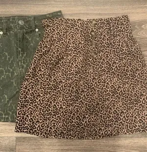 American Eagle mini skirts. Size: XXS / 00. Lot of 2. The green one is NWT. thumbnail 1