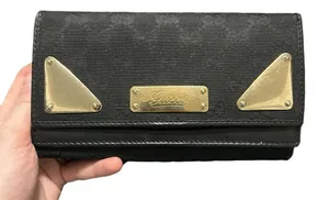 Authentic Gucci Guccissima GG Logo Black Fabric Gold Hardware Long Wallet thumbnail 1