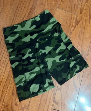 Green camo Active hustle shorts with side pockets for storage - Size Medium. ***Refer to measurement as size tag removed. Gently warn and Excellent condition. Measurements approximately 12” waste not fully stretched out x 14” long. Non-smoking home. Sold as is. Priced to sell at as is condition. If you don’t like my price make reasonable offers. thumbnail 1