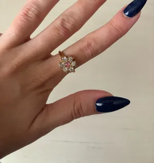 Urban Outfitters gold tone flower ring size 6 thumbnail 1
