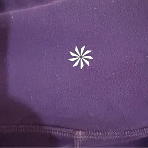 Athleta Purple cropped Leggings size Large 21” inseam thumbnail 3