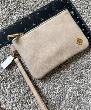 Kendra Scott Pebbled Leather Wristlet in Light Beige with Gold Hardware thumbnail 1