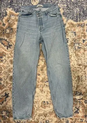 Women’s Abercrombie asymmetrical jeans size 8 thumbnail 1