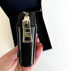 Prada Triangle-Shaped Mini Pouch in Black thumbnail 5