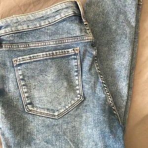 Rockstar super skinny petite mid rise built in warm thumbnail 2