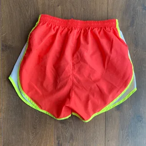 Nike Women’s Dri-FIT Tempo Running Shorts XS Bright Orange/Pink Neon Trim thumbnail 5