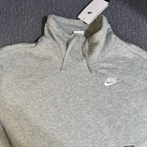 Nike Women’s Club Fleece Lined Mock Neck Oversized Sweatshirt thumbnail 7