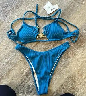 NWT zaful women’s cutout bikini. Blue and gold. Ties in back thumbnail 1