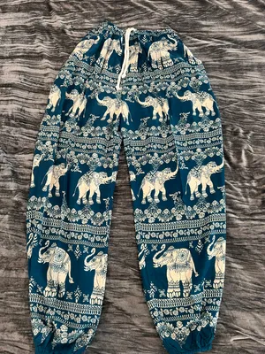 Elephant print teal jogger style pants One size S-L By Kathmandu thumbnail 1