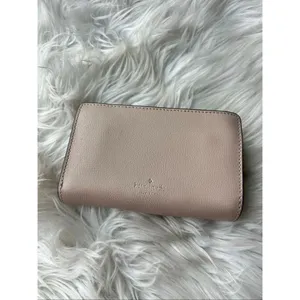 Kate Spade Adel Medium Bifold Wallet in pink and tan on the outside thumbnail 3