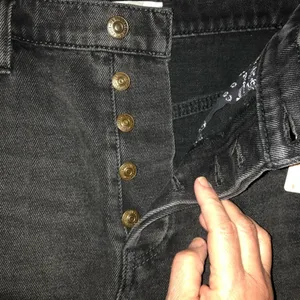 We the Free Size 27‎ Black denim distressed, vintage inspired, mini skirt. thumbnail 3