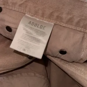 NWOT AGOLDE X FREE PEOPLE Pink Salt Criss-Cross Upsized Jeans thumbnail 9
