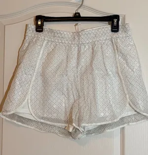 Lululemon Find Your Flock white with clear nylon overlay shorts. SZ 10 thumbnail 1