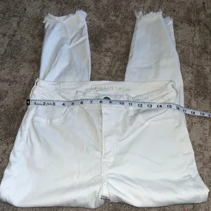 American Eagle White Distressed High-Waisted Jeans with Frayed Hem size 14 thumbnail 3