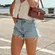 Levi's | 501 Original 100% Cotton Cut Off Raw Hem Jean Shorts in Medium Blue