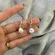 Gold Pearl Spiral Earrings