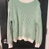green sweater
