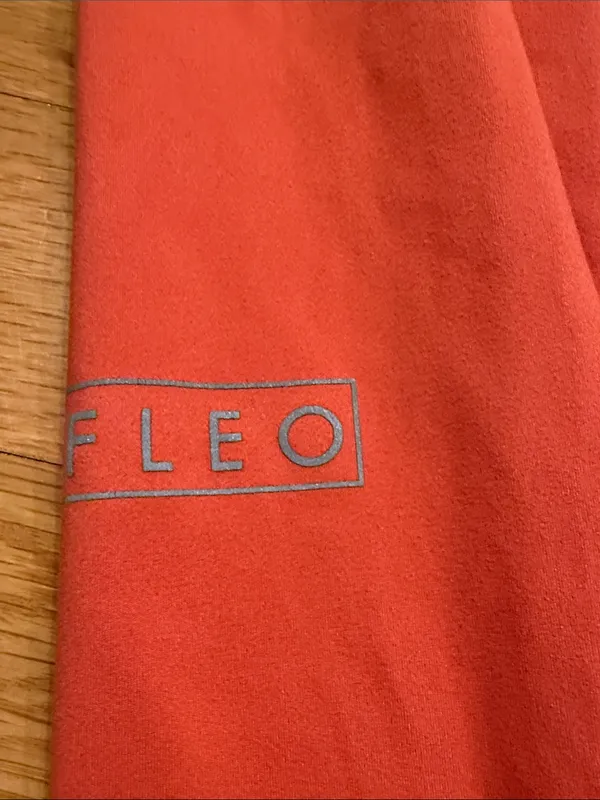 Fleo orange leggings size large . - Image 7