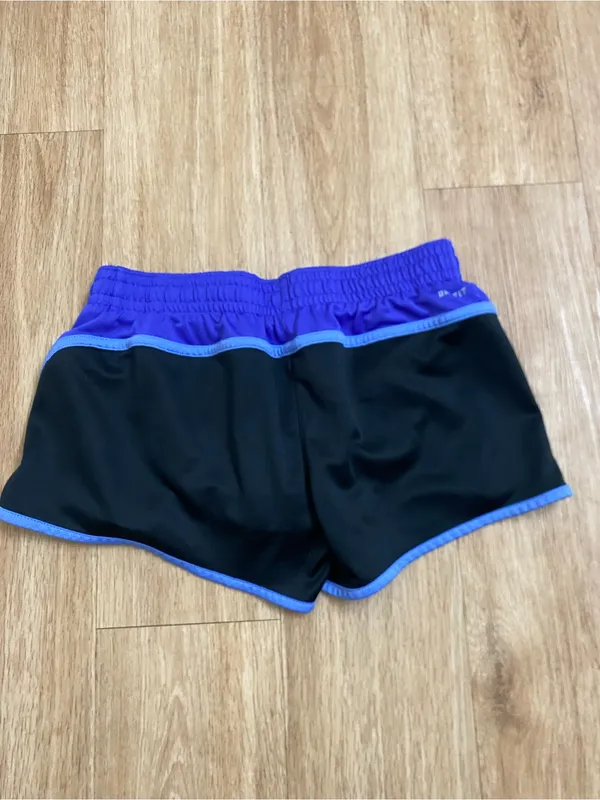 Nike Women’s Black Shorts with Purple Trim - Image 2
