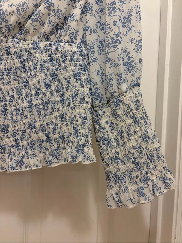 Promesa Blue and White Floral Smocked V-Neck Blouse - Image 2