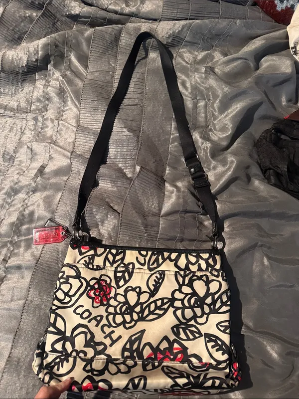 Coach Cream Crossbody Bag with Black Floral Script and Red Accents - Image 2