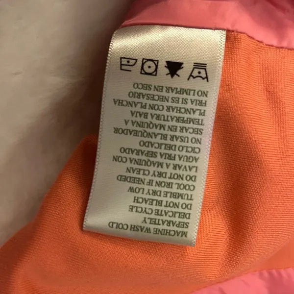 a Tangerine women's puffer vest in pink with orange side panels. Size large - Image 7