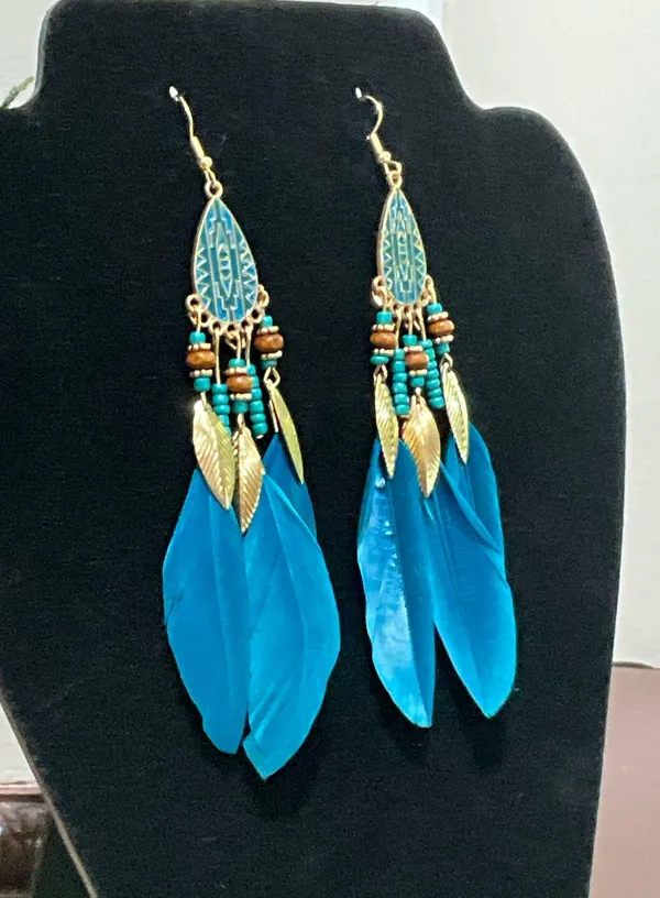 Blue feather earrings with gold accents - Image 2