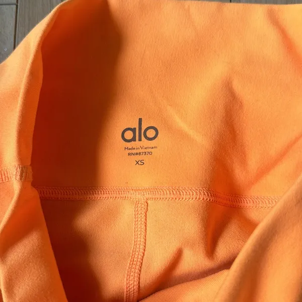 Alo Bright Orange Biker Shorts - Image 2