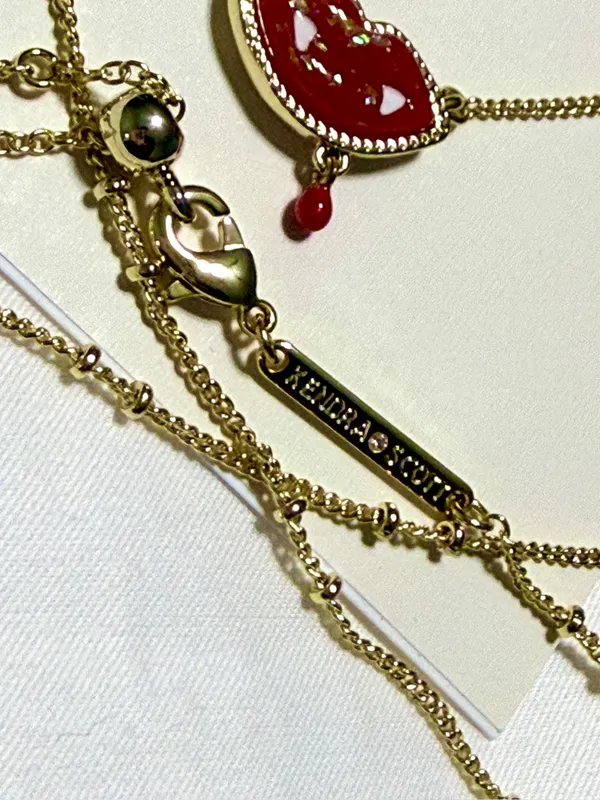 Kendra Scott red lip earrings featuring a playful vampire fang and blood drop de - Image 4
