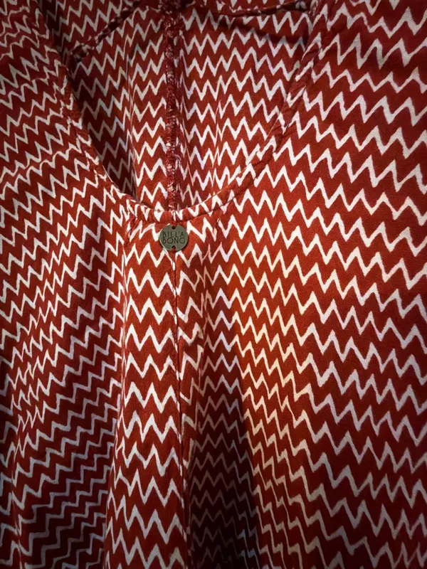 Billabong Red and White Chevron Zig Zag Print Long Sleeve Romper - Image 4
