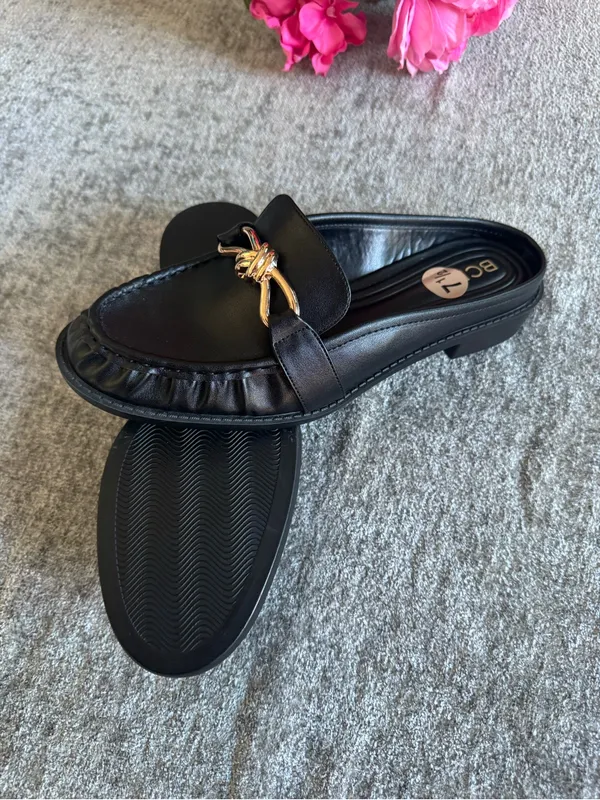 BCBG Black Leather Mules with Gold Knot Detail - Image 9