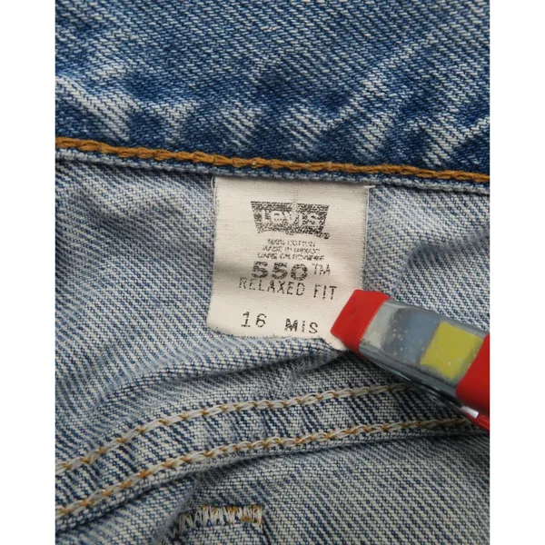Vintage Levis 550 Relaxed Fit Denim Cut Off Shorts MedWash Blue Frayed Hem 16MIS - Image 4