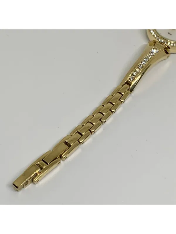 Armitron women’s watch gold tone 24mm mop dial quartz rhinestones running - Image 6