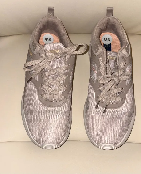 The sneakers are from the U.S. Polo Assn. brand in a pale pink tone with breathable mesh. - Image 2