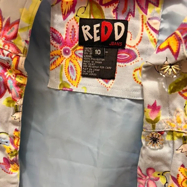 Redd Jeans floral denim trucker jacket featuring colorful flowers and rhinestone buttons - Image 4